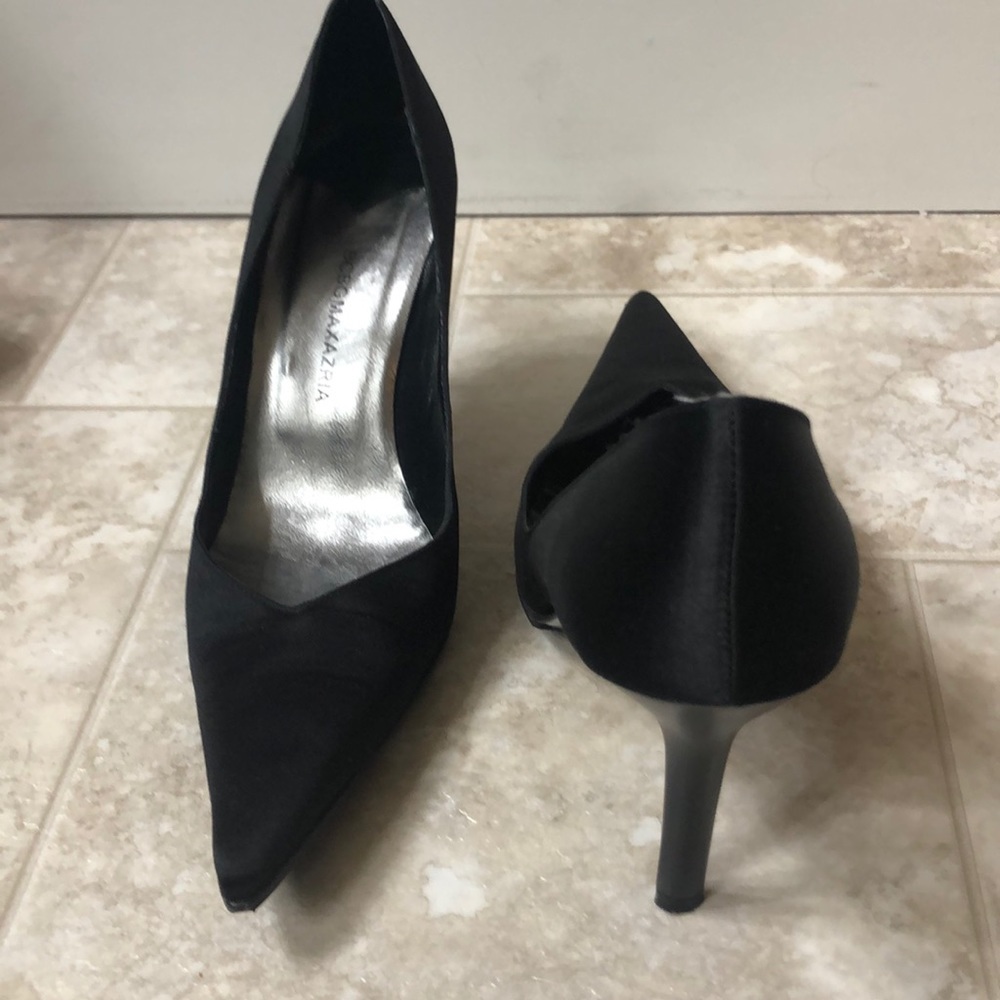 Black satin pumps by BCBG. Size 7. Worn 1x